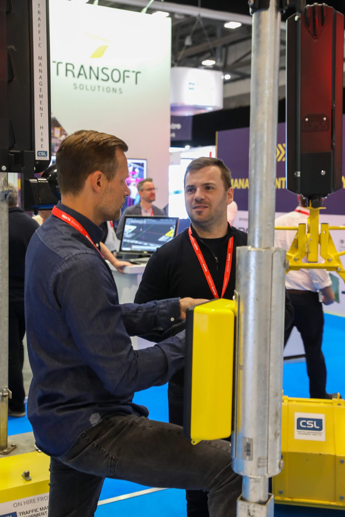 Visitors in conversation on the Traffex show floor